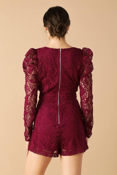 Back view of burgundy lace woven romper with zipper detail.