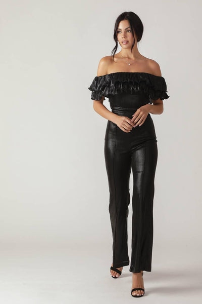 Full body view of black Angel Eyes coated woven jumpsuit