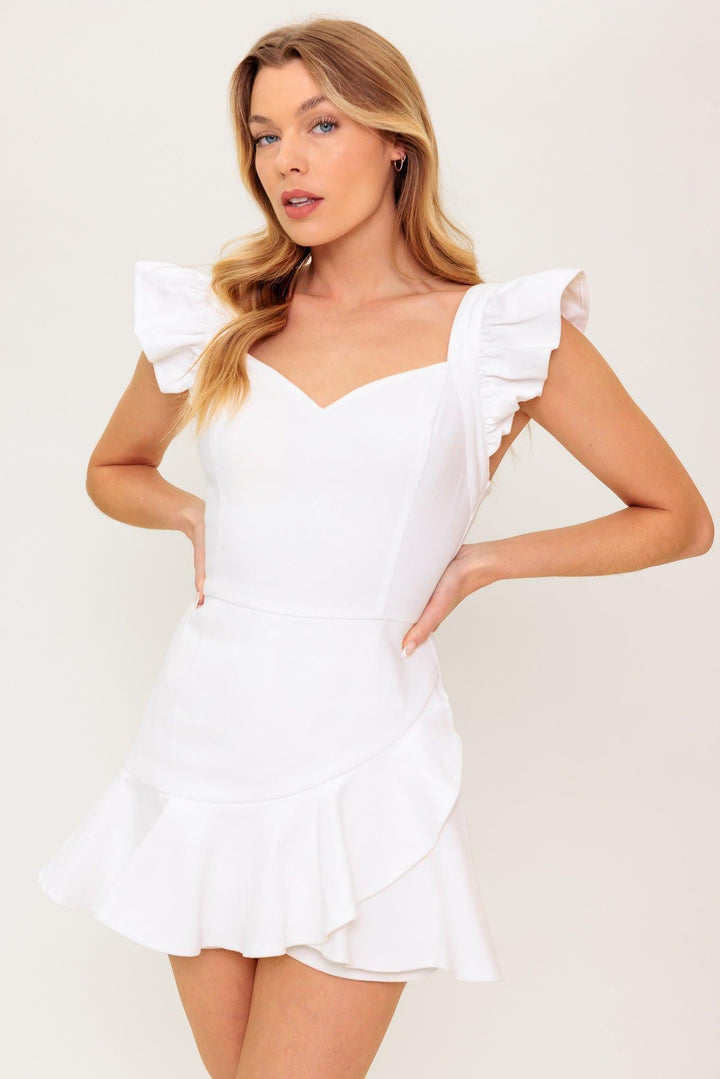 EXPLORING NEW CITIES WOVEN SKORT ROMPER