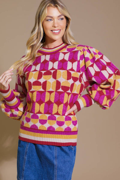 Colorful jacquard sweater with geometric pattern, front view