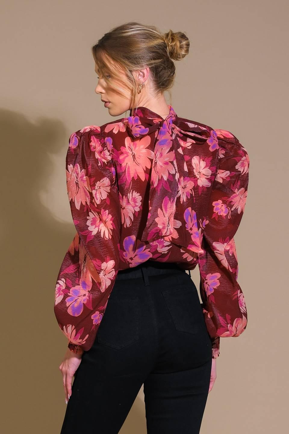 Burgundy floral woven top with puff sleeves, back view