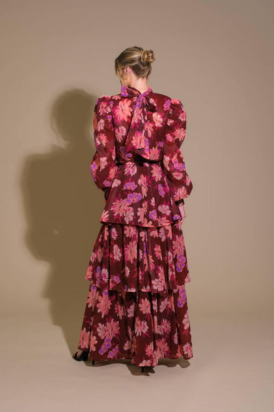 Back view of burgundy floral top with tiered skirt