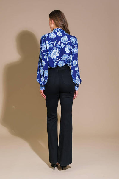 Navy floral woven top with long sleeves, full back view