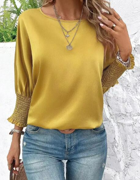 Smocked cuffs  Long sleeve blouse