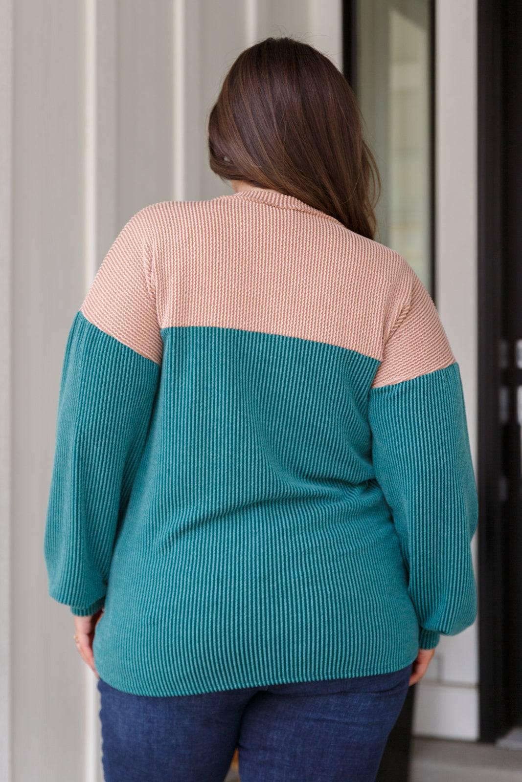 Back view of ribbed floral color block top