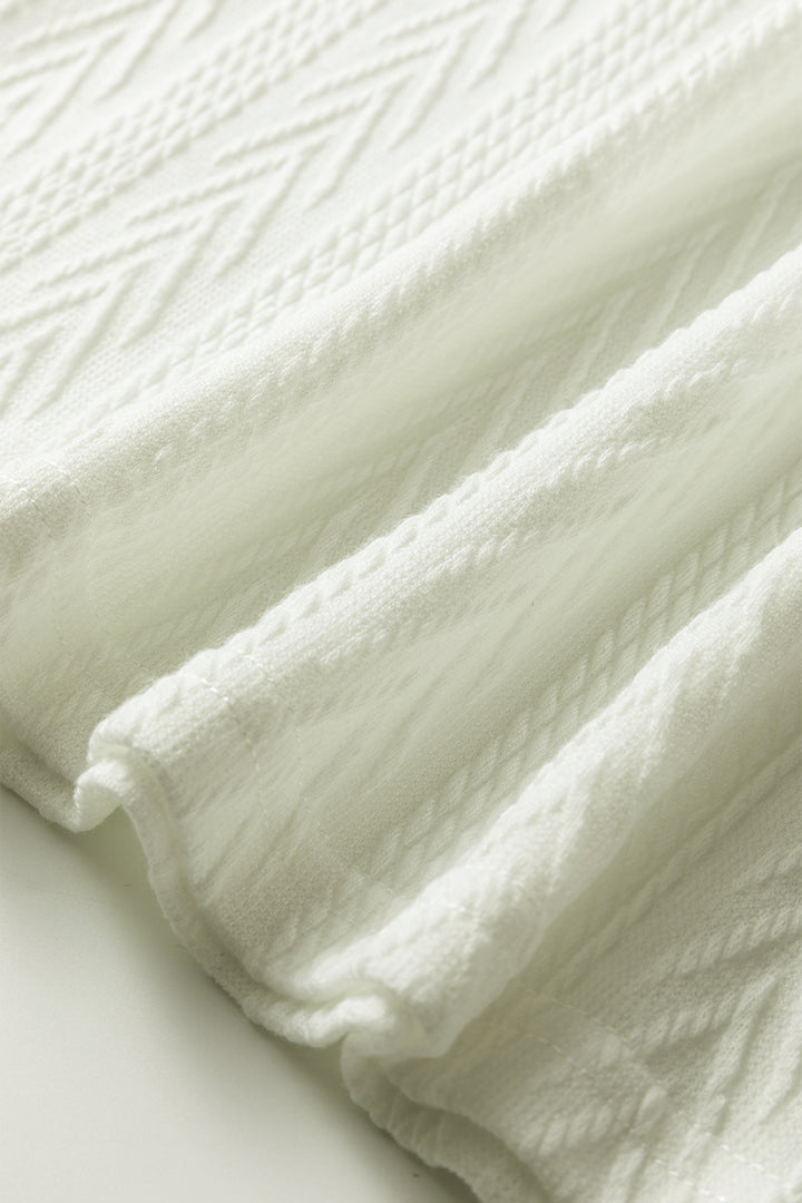 White Floral Patchwork Textured Knit Drawstring V Neck Blouse