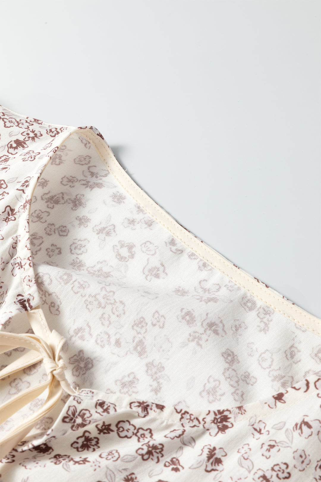 White Bow Tie Front Floral Print Flounce Sleeve Peplum Blouse