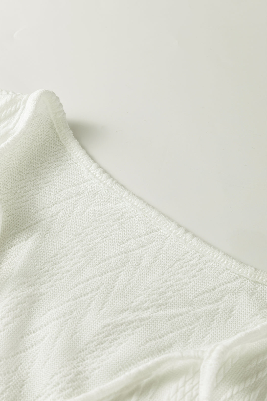 White Floral Patchwork Textured Knit Drawstring V Neck Blouse