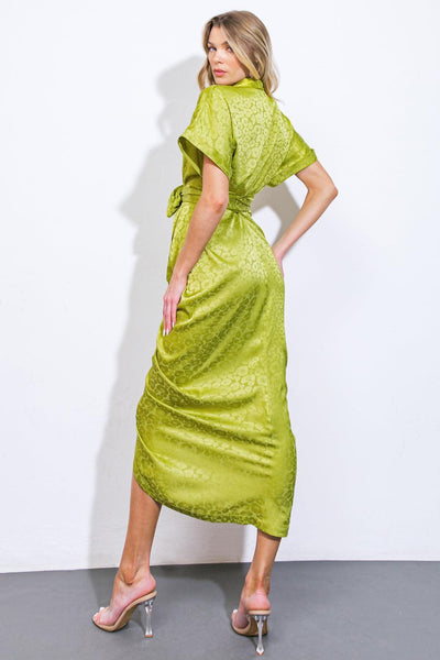 Back view of yellow green satin midi dress with tie waist