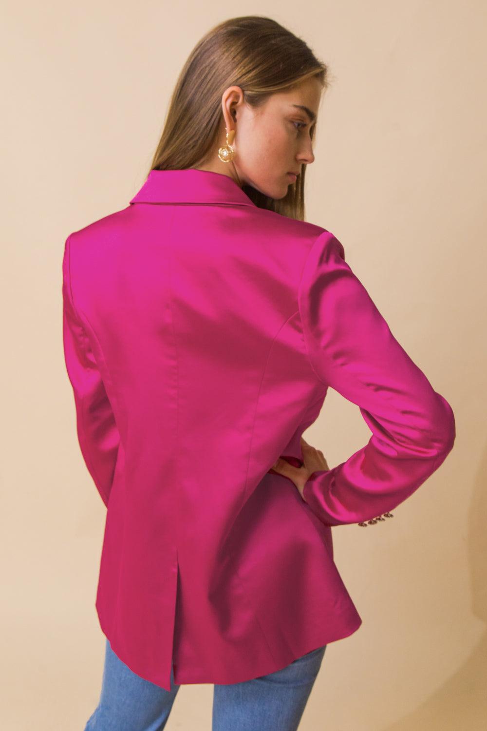 Back view of pink blazer with jeans