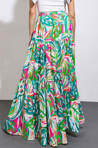 Back view of vibrant woven maxi skirt with floral design.