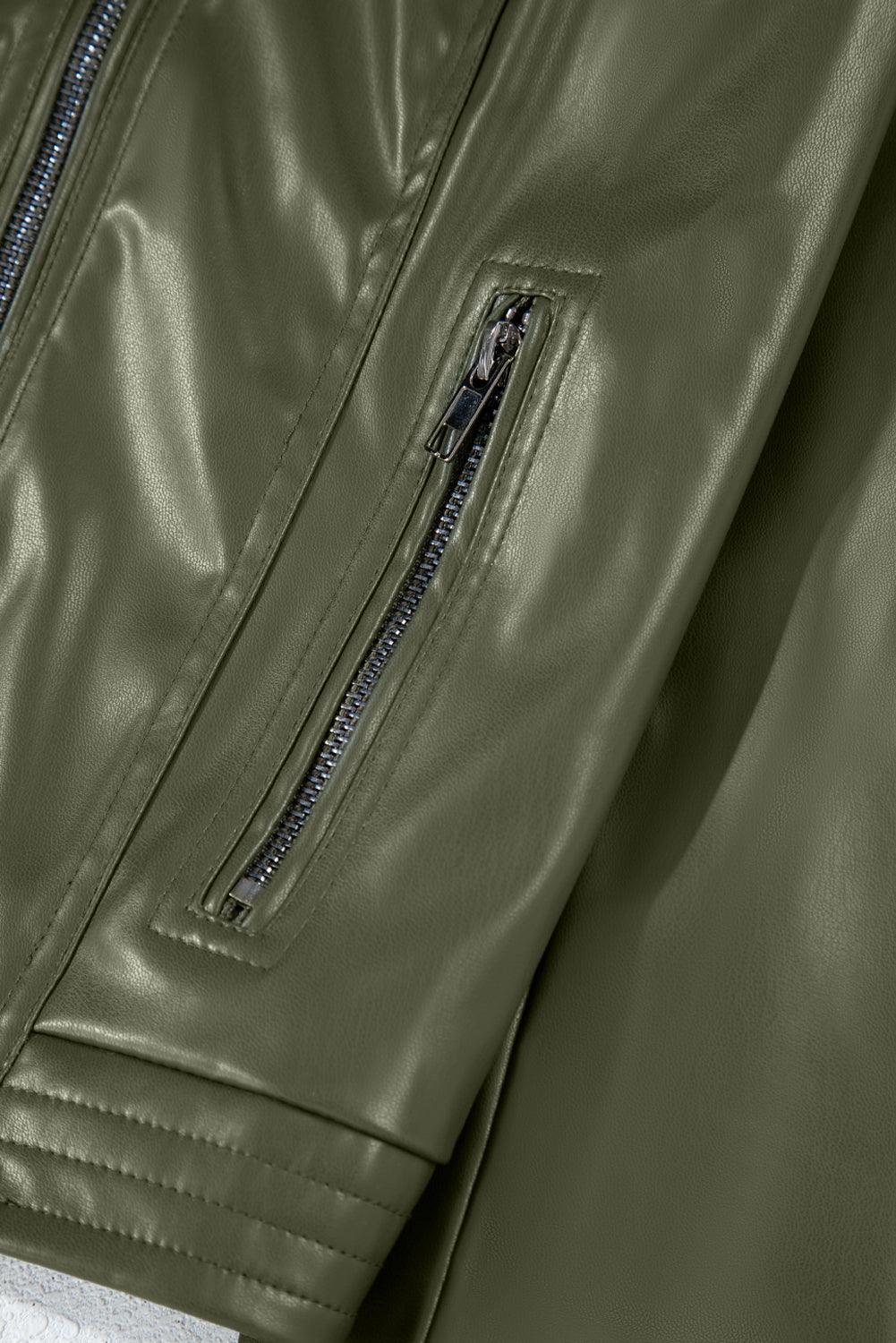 Zipper pocket detail on sage green faux leather jacket