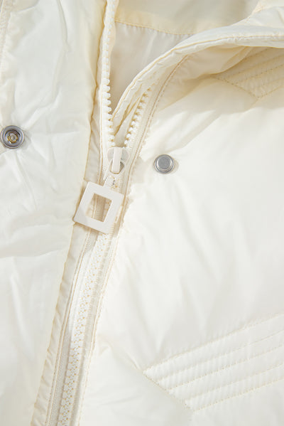 Back collar detail of white quilted high neck jacket vest