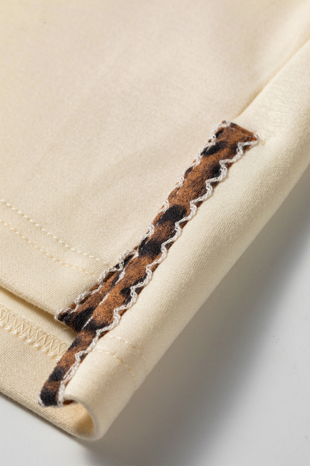 Beige Mock Neck Long Sleeve Leopard Detail Split Hem Top
