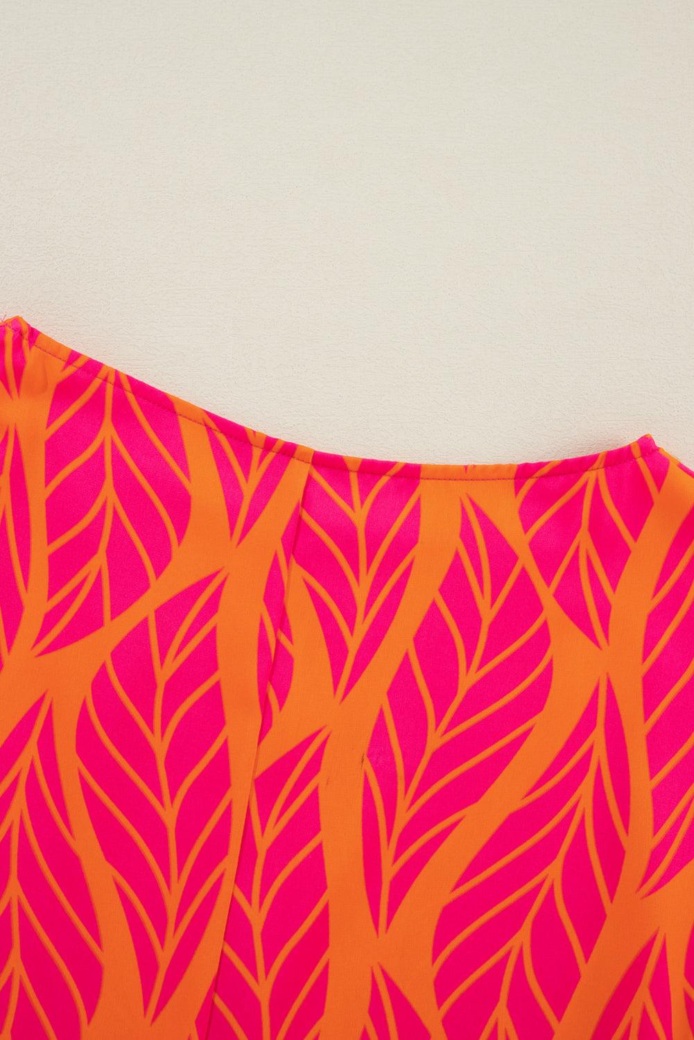 Close-up of fabric pattern on tropical leaf print blouse