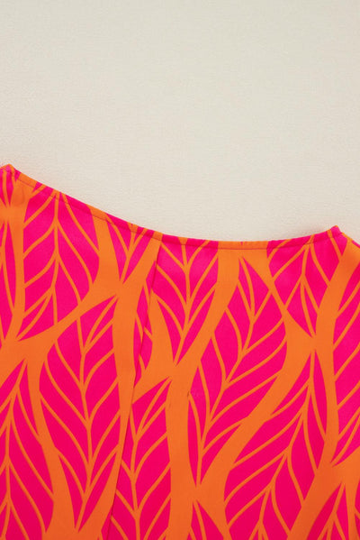 Close-up of fabric pattern on tropical leaf print blouse