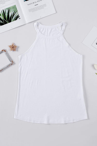 Flat lay of white solid color crew neck tank top