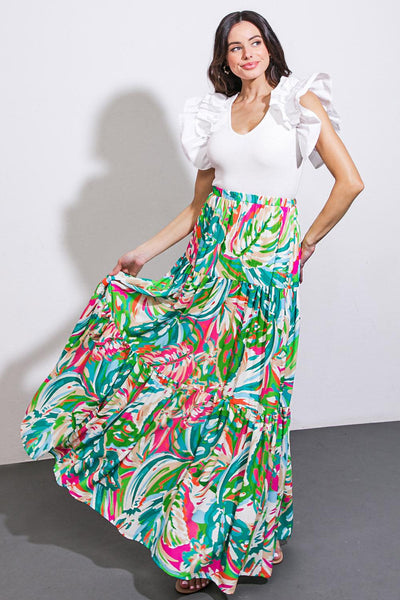 Colorful woven maxi skirt with green and pink patterns.