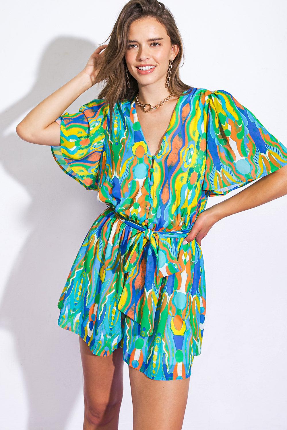 Colorful woven romper with abstract pattern, front view