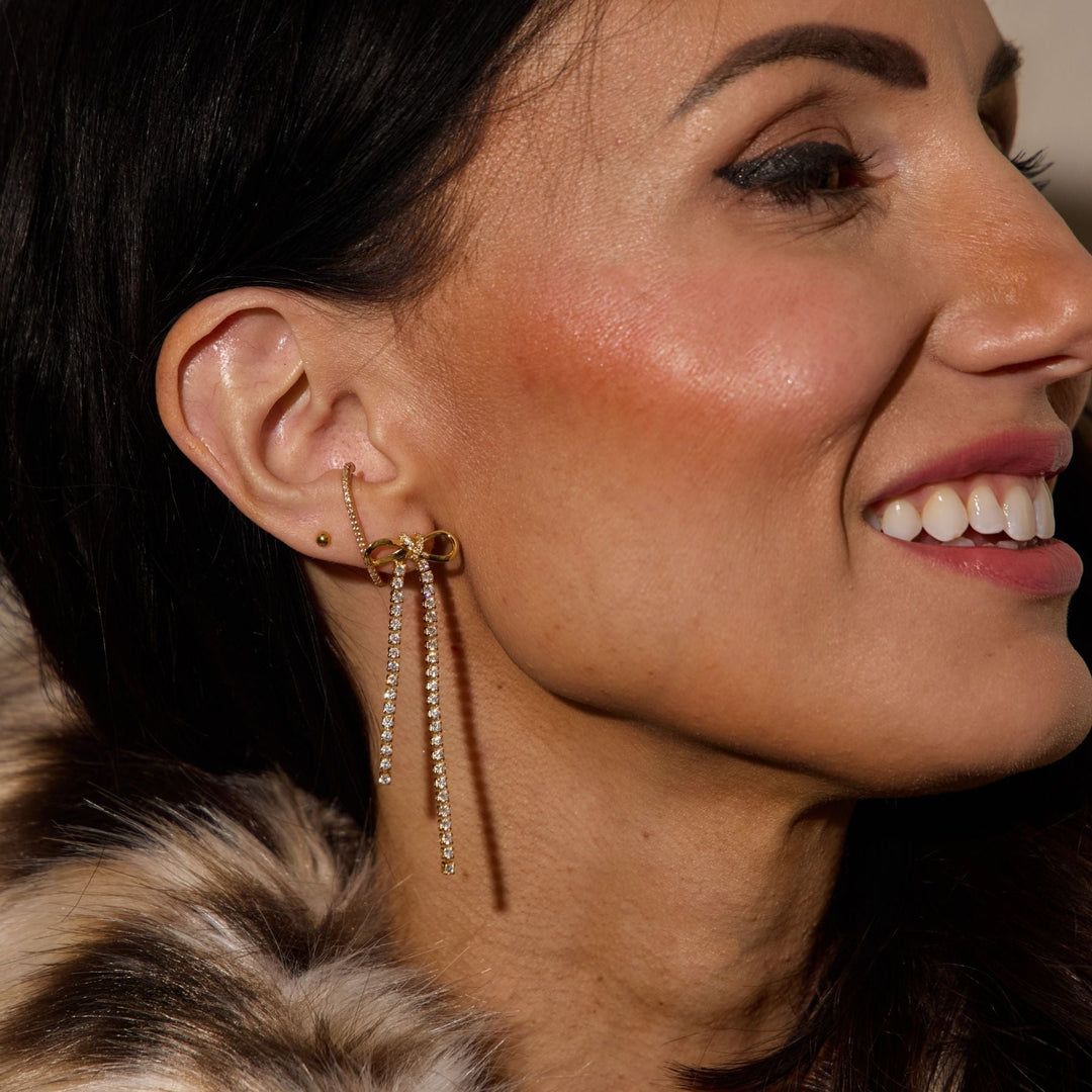 Gold Long Crystal Bow Drop Studs