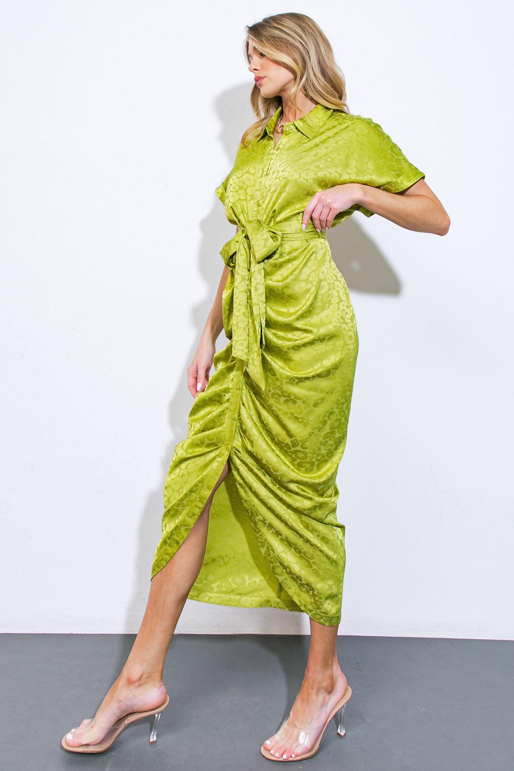 Side view of yellow green satin midi dress with front slit