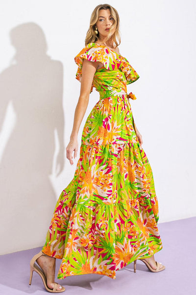 Model twirling in floral poplin maxi dress