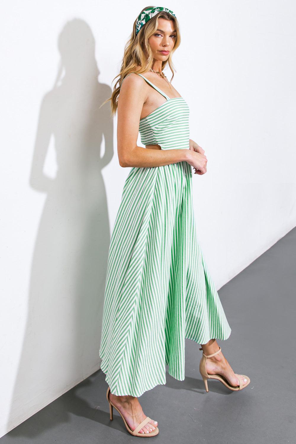 Side view of green striped woven midi dress