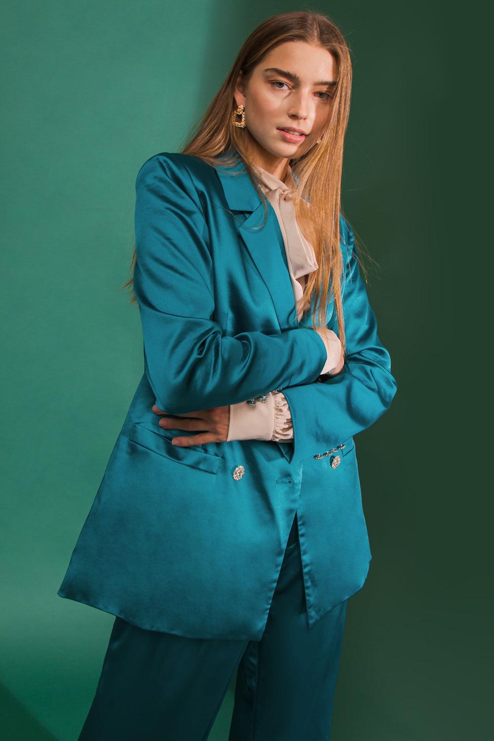 Teal blazer with beige blouse and matching pants