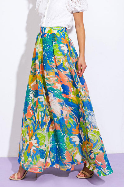 Side view of Coastal Chic woven maxi skirt with colorful print.